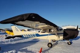 ProFlite of Alaska N80322 on the snow-covered ramp at Fairbanks with engine cover