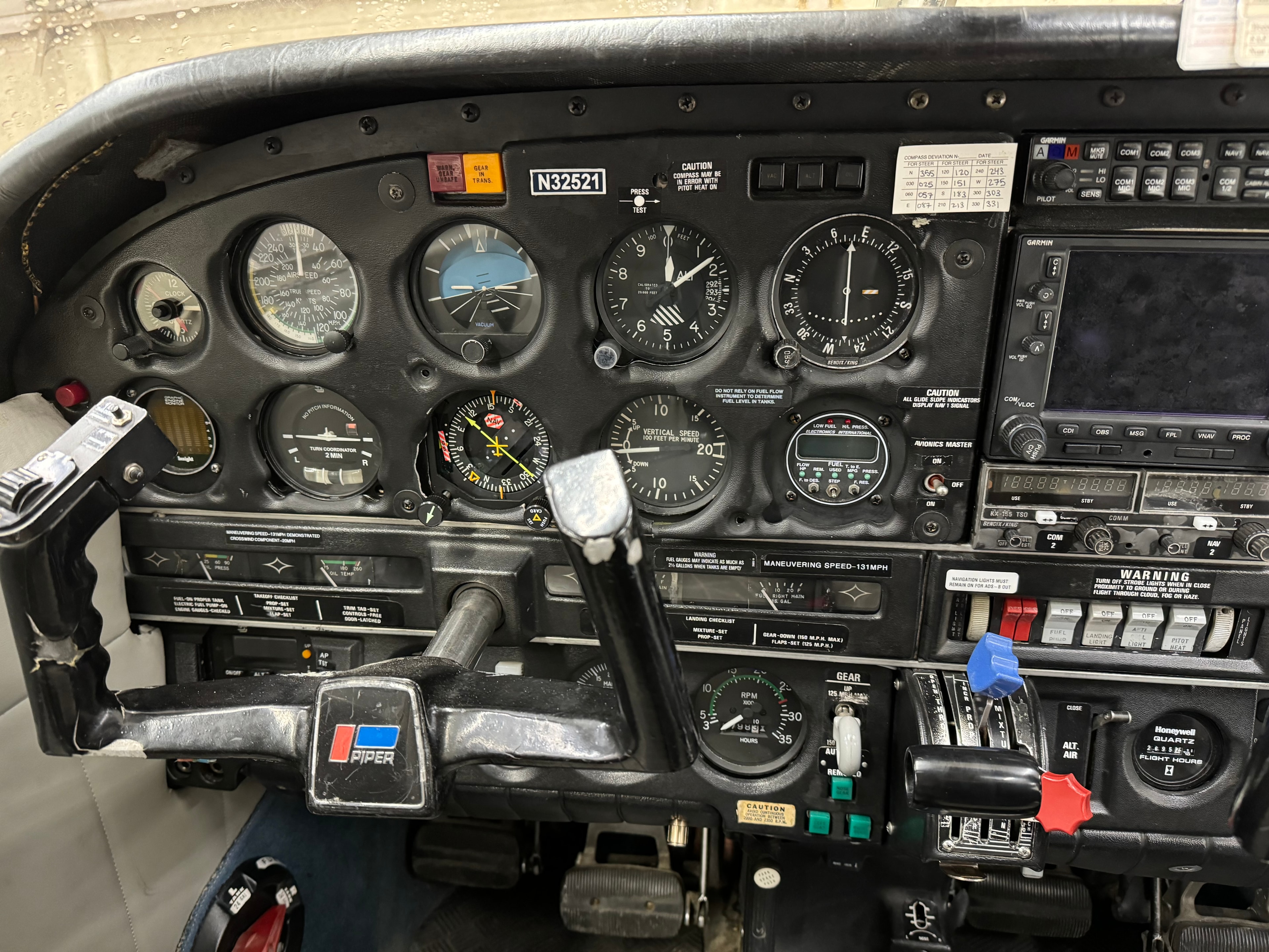 Instrument panel of ProFlite N32521 Piper Cherokee showing flight instruments and avionics